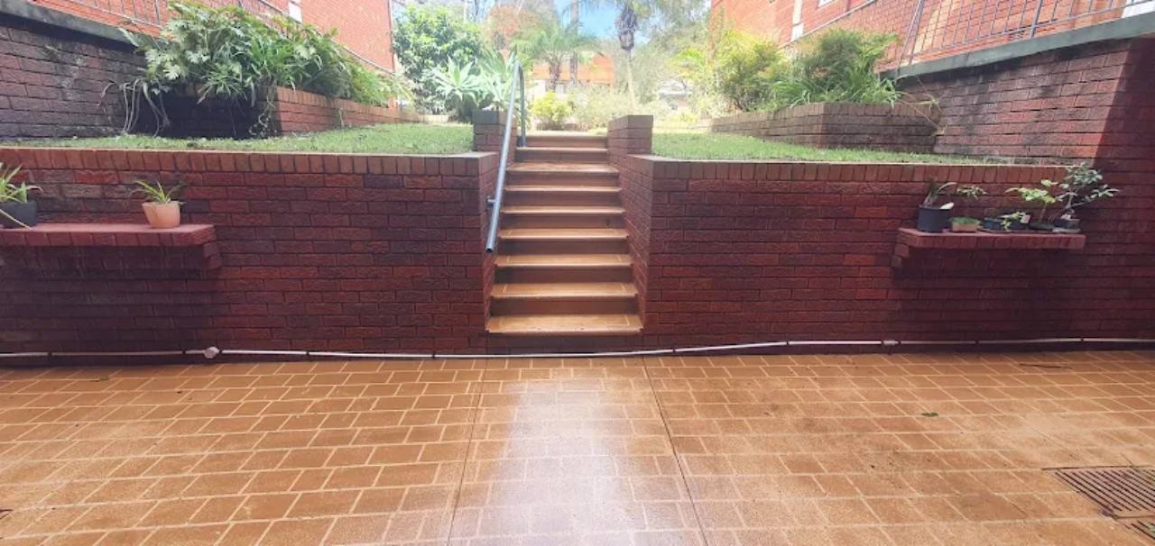 Courtyard and stairs after professional pressure cleaning