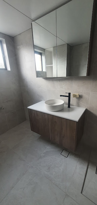 Completed wall-hung bathroom vanity and tap installation by Aquastar Plumbing Services