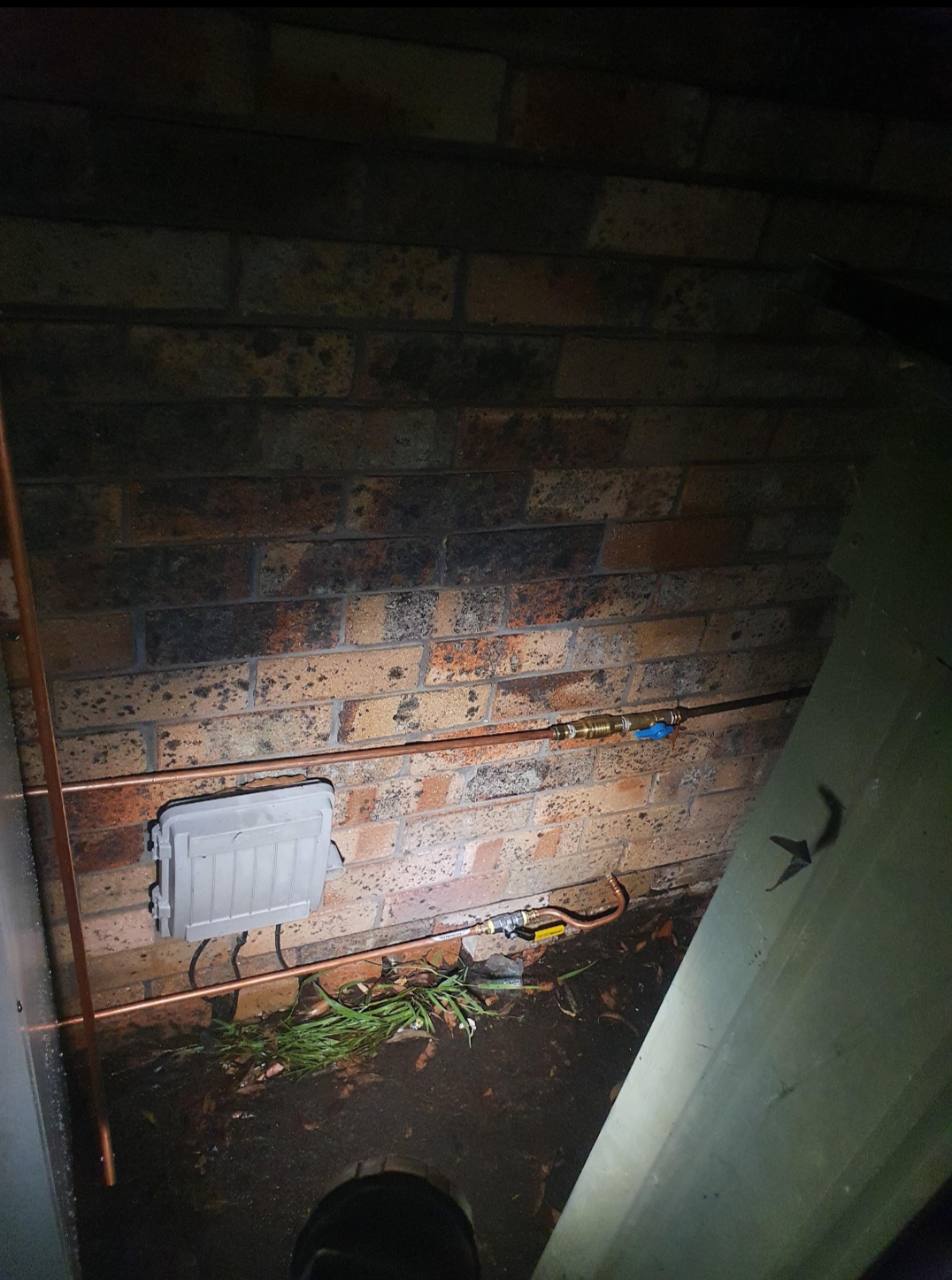 New copper pipework and valves installed for a replacement hot-water system